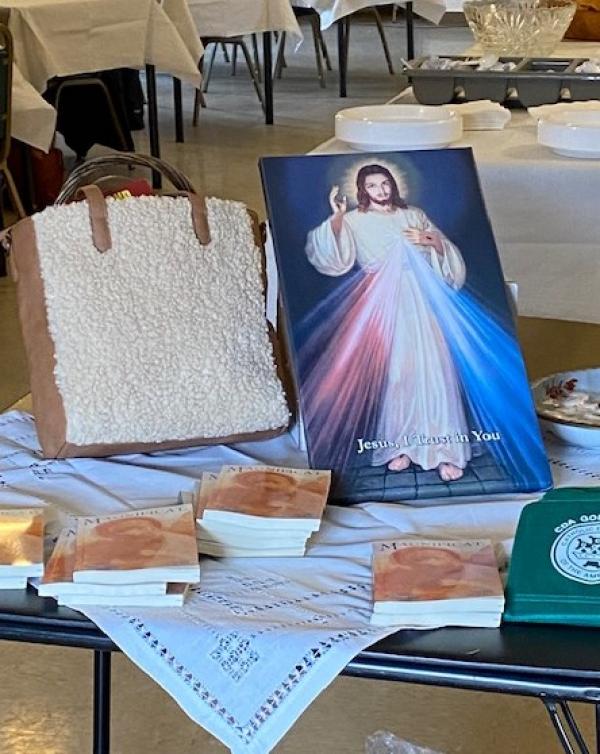 A gorgeous handbag and a lovely Divine Mercy print were two door prizes drawn during the luncheon.  Copies and the May Magnificat were available to all participates at the retreat as well as Divine Mercy cards.